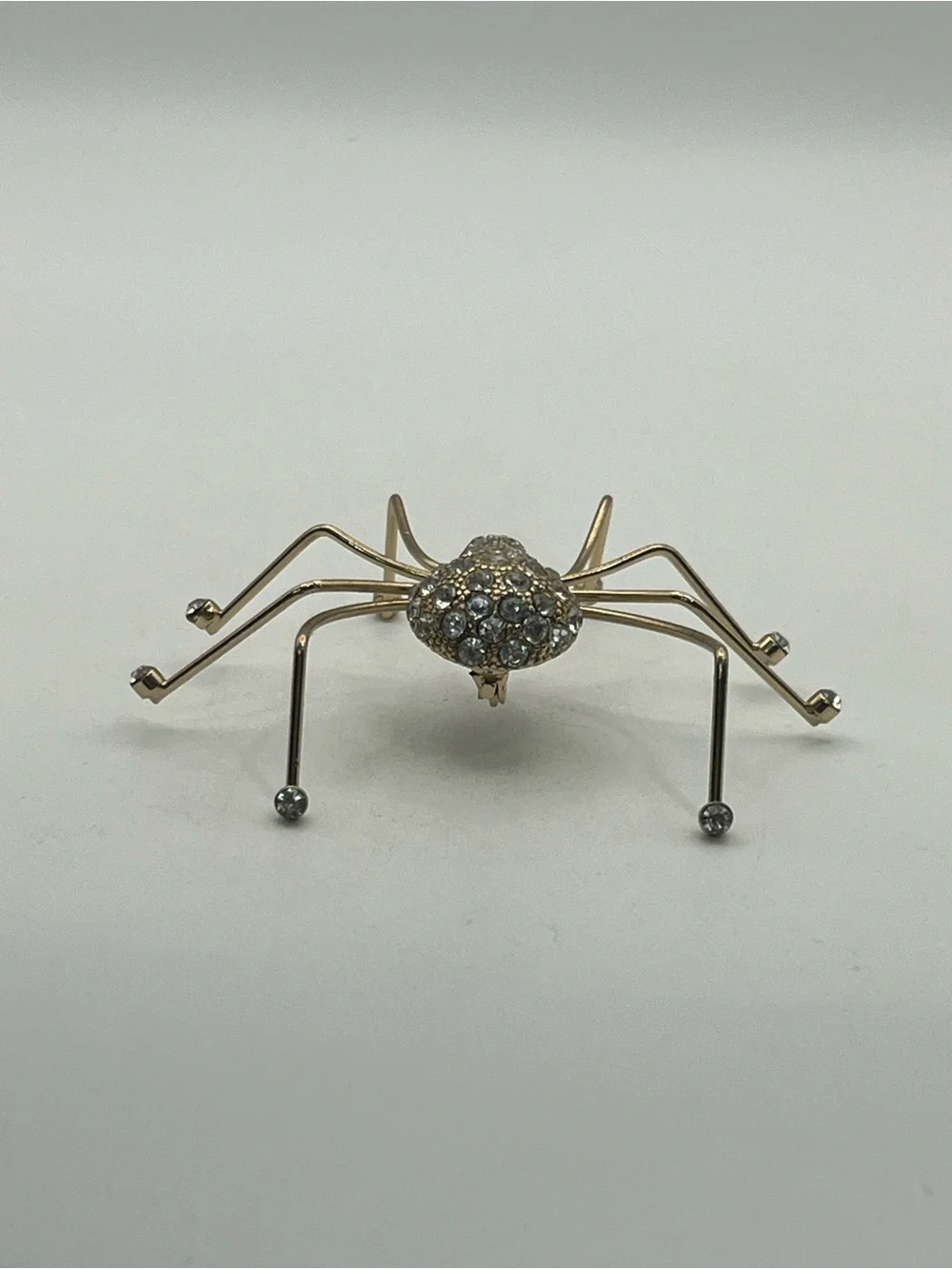 Spider insect gold tone clear rhinestone brooch pin